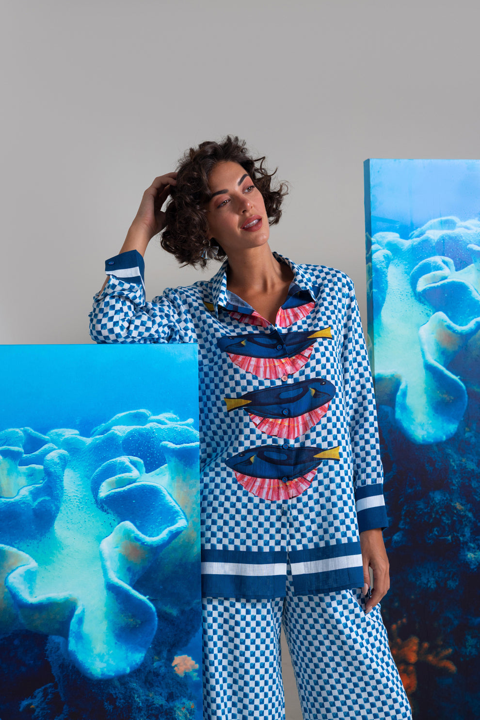 Nautanky Overlaying shell and fish