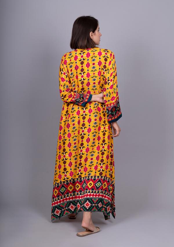 Meghna Panchmatia Yellow Patola Printed Kurta with Asymmetric Hemline.