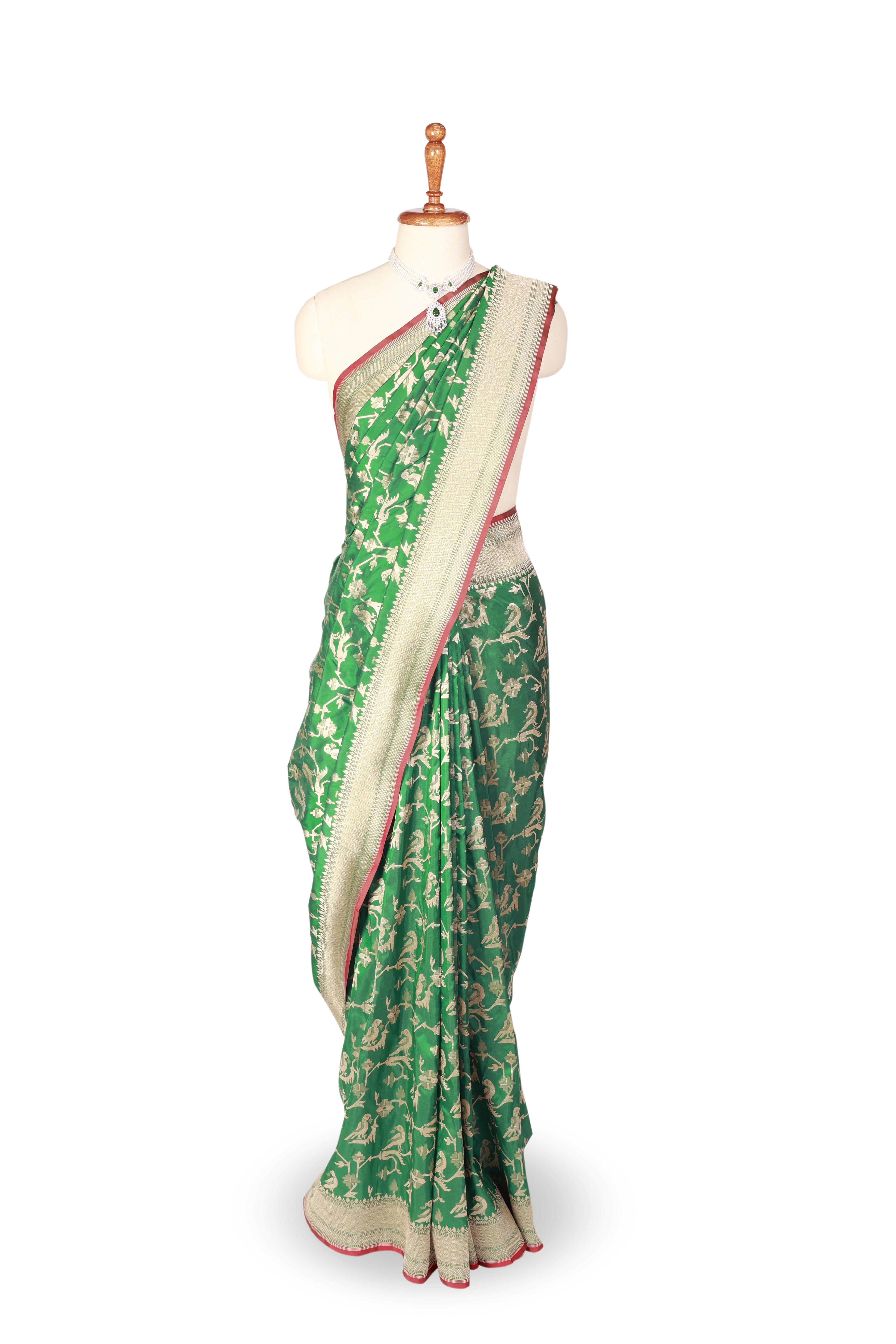 Enchanting Green Silk Saree with Cream Dancing Motifs and Gold Border