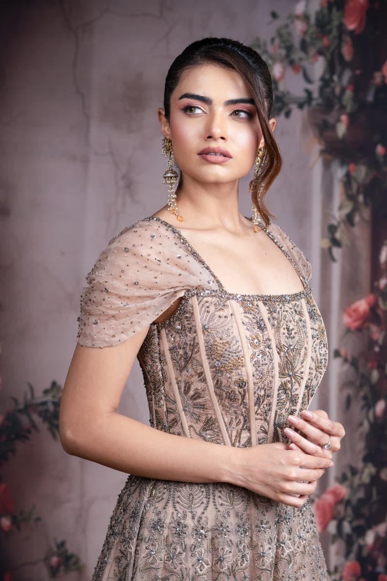 Just like that: Champagne Gold Embroidered Gown with Structured Bodice and Draped Sleeves
