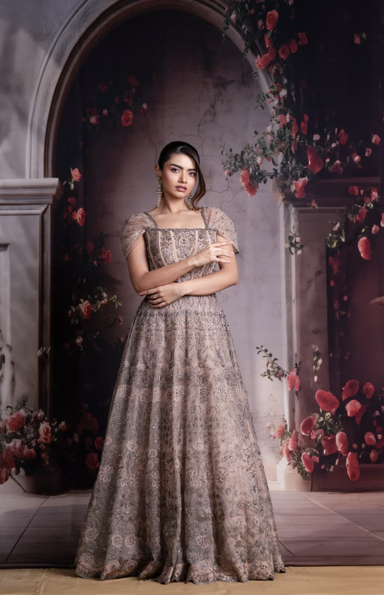 Just like that: Champagne Gold Embroidered Gown with Structured Bodice and Draped Sleeves