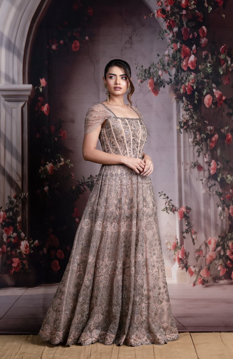 Just like that: Champagne Gold Embroidered Gown with Structured Bodice and Draped Sleeves