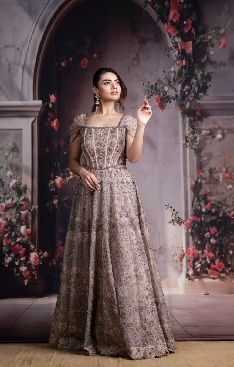 Just like that: Champagne Gold Embroidered Gown with Structured Bodice and Draped Sleeves